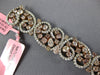 LARGE & LONG 15.49CT WHITE & PINK DIAMOND 18KT WHITE & ROSE GOLD TENNIS BRACELET
