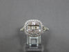 WIDE .71CT DIAMOND 14KT WHITE GOLD ROUND & BAGUETTE CLUSTER SQUARE INFINITY RING