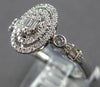 ESTATE .32CT DIAMOND 14KT WHITE GOLD ROUND & BAGUETTE OVAL DOUBLE HALO FUN RING