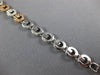 WIDE .97CT WHITE & PINK DIAMOND 18KT WHITE & ROSE GOLD CIRCULAR TENNIS BRACELET
