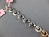WIDE .97CT WHITE & PINK DIAMOND 18KT WHITE & ROSE GOLD CIRCULAR TENNIS BRACELET
