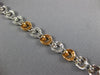 WIDE .97CT WHITE & PINK DIAMOND 18KT WHITE & ROSE GOLD CIRCULAR TENNIS BRACELET