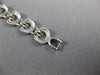 WIDE .97CT WHITE & PINK DIAMOND 18KT WHITE & ROSE GOLD CIRCULAR TENNIS BRACELET