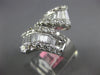EXTRA LARGE 3CT DIAMOND 18KT WHITE GOLD 3D ROUND & BAGUETTE CRISS CROSS FUN RING