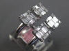 ESTATE .78CT DIAMOND 18KT WHITE GOLD 3D ROUND & BAGUETTE SQUARE TENSION FUN RING