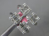 ESTATE .78CT DIAMOND 18KT WHITE GOLD 3D ROUND & BAGUETTE SQUARE TENSION FUN RING