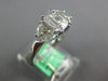 .97CT DIAMOND 18KT WHITE GOLD BAGUETTE & MOON CUT 3 STONE LOOK ENGAGEMENT RING