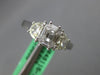 .97CT DIAMOND 18KT WHITE GOLD BAGUETTE & MOON CUT 3 STONE LOOK ENGAGEMENT RING