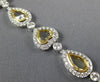 LARGE 13.95CT WHITE & CANARY DIAMOND 18KT 2 TONE GOLD HALO LOVE TENNIS BRACELET