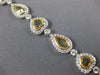 LARGE 13.95CT WHITE & CANARY DIAMOND 18KT 2 TONE GOLD HALO LOVE TENNIS BRACELET