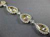 LARGE 13.95CT WHITE & CANARY DIAMOND 18KT 2 TONE GOLD HALO LOVE TENNIS BRACELET