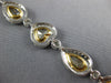LARGE 13.95CT WHITE & CANARY DIAMOND 18KT 2 TONE GOLD HALO LOVE TENNIS BRACELET