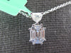 .69CT DIAMOND 18KT WHITE GOLD BAGUETTE KITE CUT CLUSTER OCTAGON FLOATING PENDANT