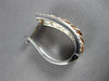 WIDE .19CT DIAMOND 14KT WHITE & ROSE GOLD OVAL LOVE KNOT HUGGIE HANGING EARRINGS
