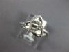 ESTATE .13CT DIAMOND 18KT WHITE GOLD 3D CLASSIC LOVE KNOT FLOWER STAR RING