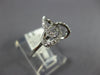 ESTATE .13CT DIAMOND 18KT WHITE GOLD 3D CLASSIC LOVE KNOT FLOWER STAR RING