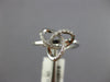 ESTATE .13CT DIAMOND 18KT WHITE GOLD 3D CLASSIC LOVE KNOT FLOWER STAR RING