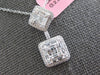1.41CT DIAMOND 18KT WHITE GOLD ROUND & BAGUETTE SQUARE CLUSTER FLOATING PENDANT