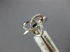 ESTATE .13CT DIAMOND 18KT WHITE GOLD 3D CLASSIC LOVE KNOT FLOWER STAR RING