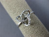 ESTATE .13CT DIAMOND 18KT WHITE GOLD 3D CLASSIC LOVE KNOT FLOWER STAR RING