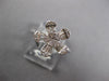 ESTATE .42CT DIAMOND 14KT WHITE GOLD CLASSIC ROUND & BAGUETTE FLOWER LOVE RING