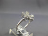 ESTATE .42CT DIAMOND 14KT WHITE GOLD CLASSIC ROUND & BAGUETTE FLOWER LOVE RING
