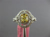 1.30CT WHITE & CANARY DIAMOND 18KT 2 TONE GOLD OVAL DOUBLE HALO ENGAGEMENT RING
