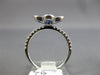 .30CT DIAMOND & AAA SAPPHIRE 18KT WHITE GOLD OVAL & ROUND FILIGREE FLOWER RING