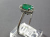 .84CT DIAMOND & AAA EMERALD 14KT WHITE GOLD 3D OVAL & ROUND HALO ENGAGEMENT RING