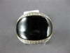ESTATE .16CT DIAMOND & AAA BLACK ONYX 14KT WHITE & YELLOW GOLD 3D OVAL FUN RING