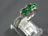 .87CT DIAMOND & AAA EMERALD 18KT 2 TONE GOLD ROUND & OVAL 3 STONE INFINITY RING