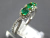.87CT DIAMOND & AAA EMERALD 18KT 2 TONE GOLD ROUND & OVAL 3 STONE INFINITY RING