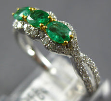 .87CT DIAMOND & AAA EMERALD 18KT 2 TONE GOLD ROUND & OVAL 3 STONE INFINITY RING