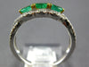 .87CT DIAMOND & AAA EMERALD 18KT 2 TONE GOLD ROUND & OVAL 3 STONE INFINITY RING
