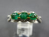 .87CT DIAMOND & AAA EMERALD 18KT 2 TONE GOLD ROUND & OVAL 3 STONE INFINITY RING