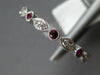 .46CT DIAMOND & AAA RUBY 18KT WHITE GOLD ROUND & MARQUISE SHAPE ANNIVERSARY RING