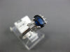 1.18CT DIAMOND & AAA SAPPHIRE 18K WHITE GOLD OVAL & BAGUETTE BOW ENGAGEMENT RING