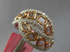 ESTATE WIDE 1.26CT WHITE & PINK DIAMOND 18K WHITE & ROSE GOLD INFINITY LOVE RING