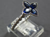 1.03CT DIAMOND & AAA SAPPHIRE 18KT WHITE GOLD PRINCESS & PEAR SHAPE FLOWER RING