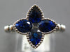 1.03CT DIAMOND & AAA SAPPHIRE 18KT WHITE GOLD PRINCESS & PEAR SHAPE FLOWER RING