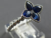 1.03CT DIAMOND & AAA SAPPHIRE 18KT WHITE GOLD PRINCESS & PEAR SHAPE FLOWER RING
