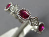 .96CT DIAMOND & AAA RUBY 18KT WHITE GOLD OVAL FLOWER FILIGREE ANNIVERSARY RING