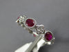 .96CT DIAMOND & AAA RUBY 18KT WHITE GOLD OVAL FLOWER FILIGREE ANNIVERSARY RING