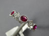 .96CT DIAMOND & AAA RUBY 18KT WHITE GOLD OVAL FLOWER FILIGREE ANNIVERSARY RING