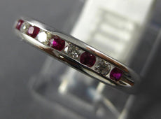.27CT DIAMOND & AAA RUBY 18KT WHITE GOLD CLASSIC ROUND CHANNEL ANNIVERSARY RING