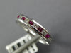 .27CT DIAMOND & AAA RUBY 18KT WHITE GOLD CLASSIC ROUND CHANNEL ANNIVERSARY RING