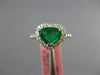 1.23CT DIAMOND & AAA EMERALD 18K WHITE GOLD TRILLION HEART SHAPE ENGAGEMENT RING