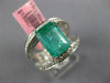 4.56CT DIAMOND & EMERALD 18KT WHITE GOLD 3D EMERALD CUT & ROUND ENGAGEMENT RING