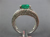 4.56CT DIAMOND & EMERALD 18KT WHITE GOLD 3D EMERALD CUT & ROUND ENGAGEMENT RING