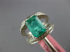 4.56CT DIAMOND & EMERALD 18KT WHITE GOLD 3D EMERALD CUT & ROUND ENGAGEMENT RING